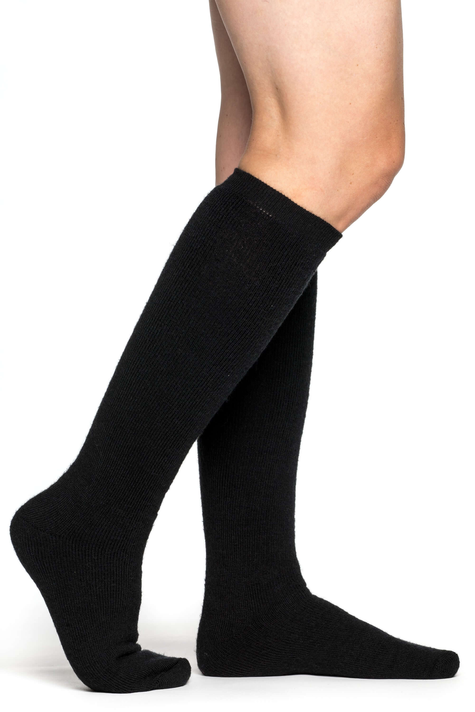 Die Woolpower Knee High 400 Socken sind Kniehohe Socken, gemacht für den Wintereinsatz, erhältlich im Outdoor Online Shop FluxPerfect